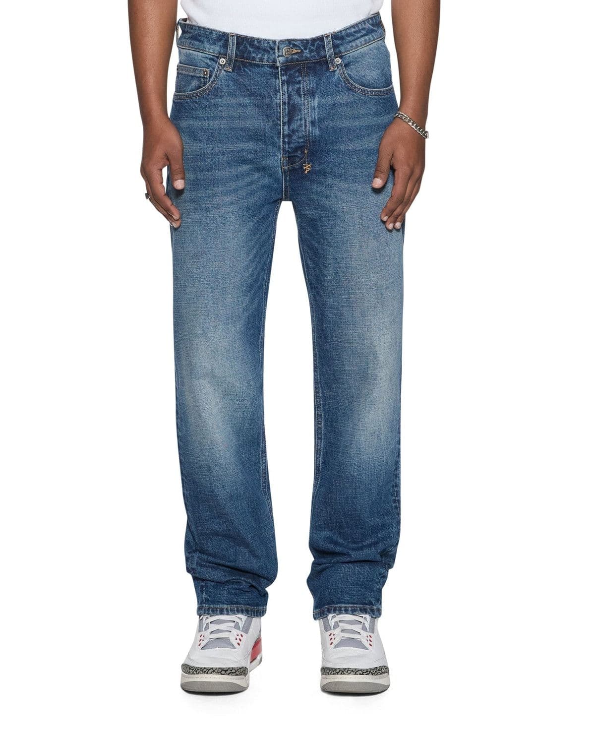 Model wearing Hazlow Arden wash denim jeans
