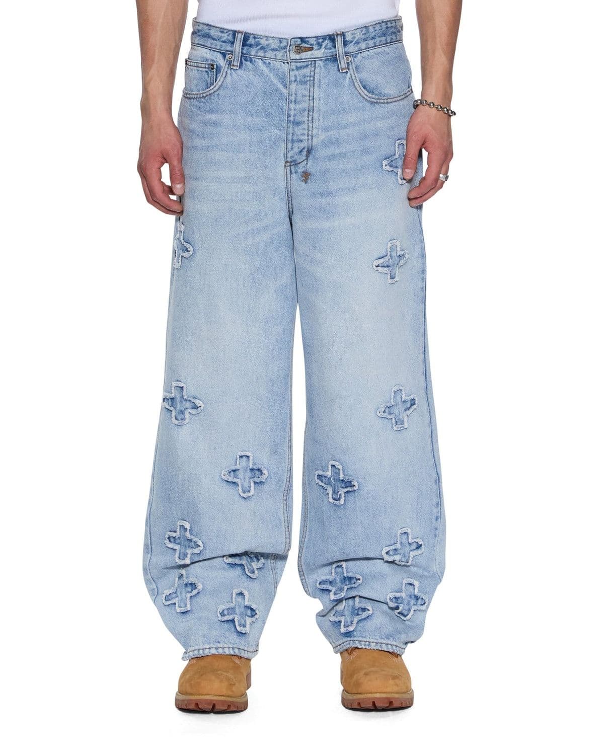Model wearing baggy-fit Maxx Kraftwerk denim jeans