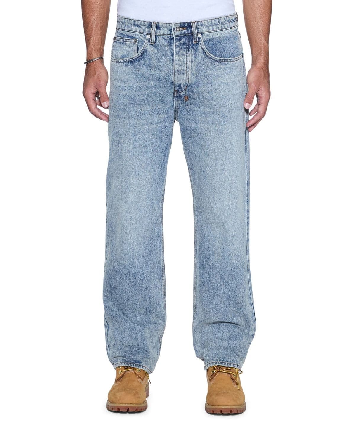 Model wearing relaxed-fit Anti K Champagne Blue denim jeans