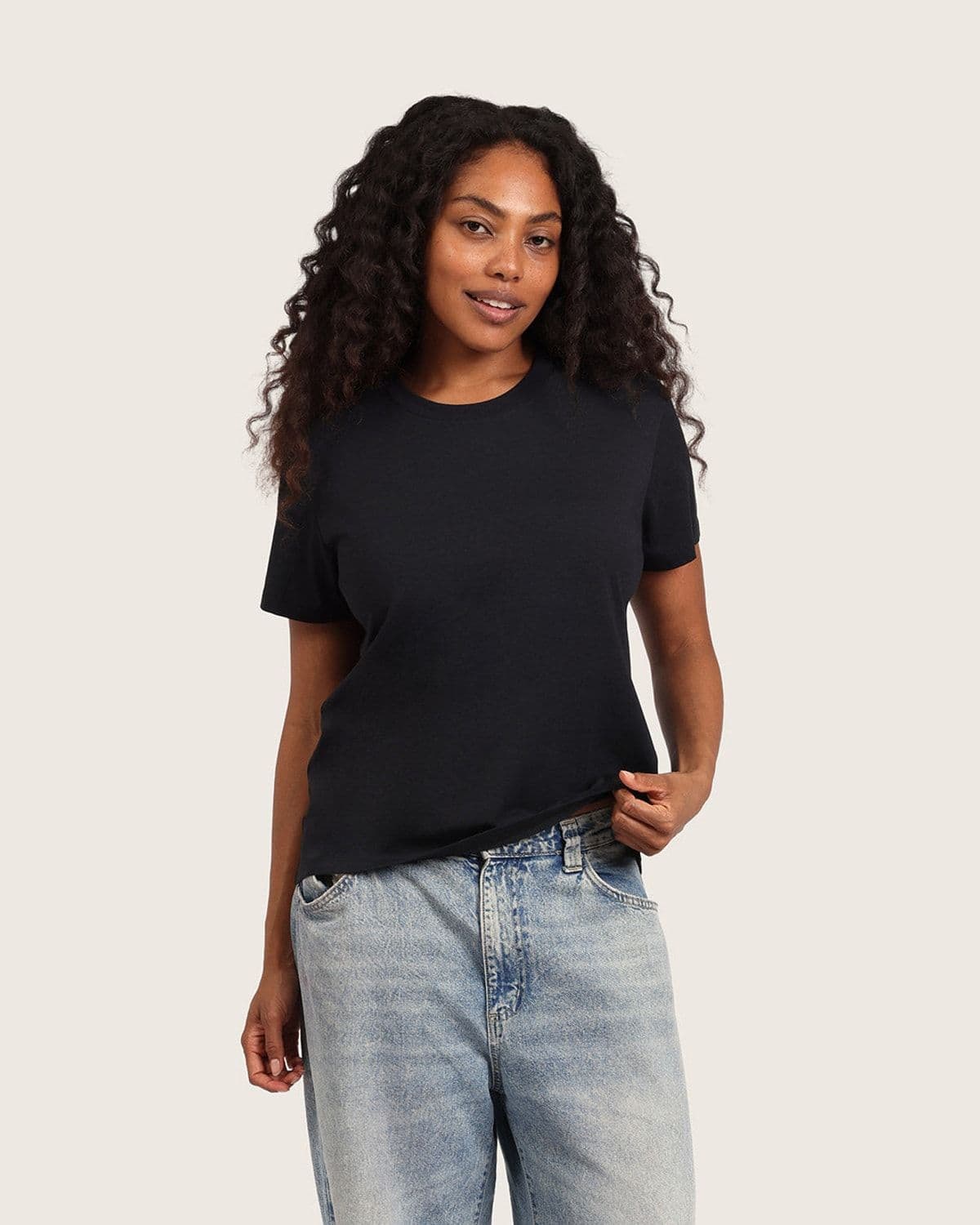 Model wearing Boody's Women's Classic Crew Neck T-Shirt in black, on-body lifestyle shot