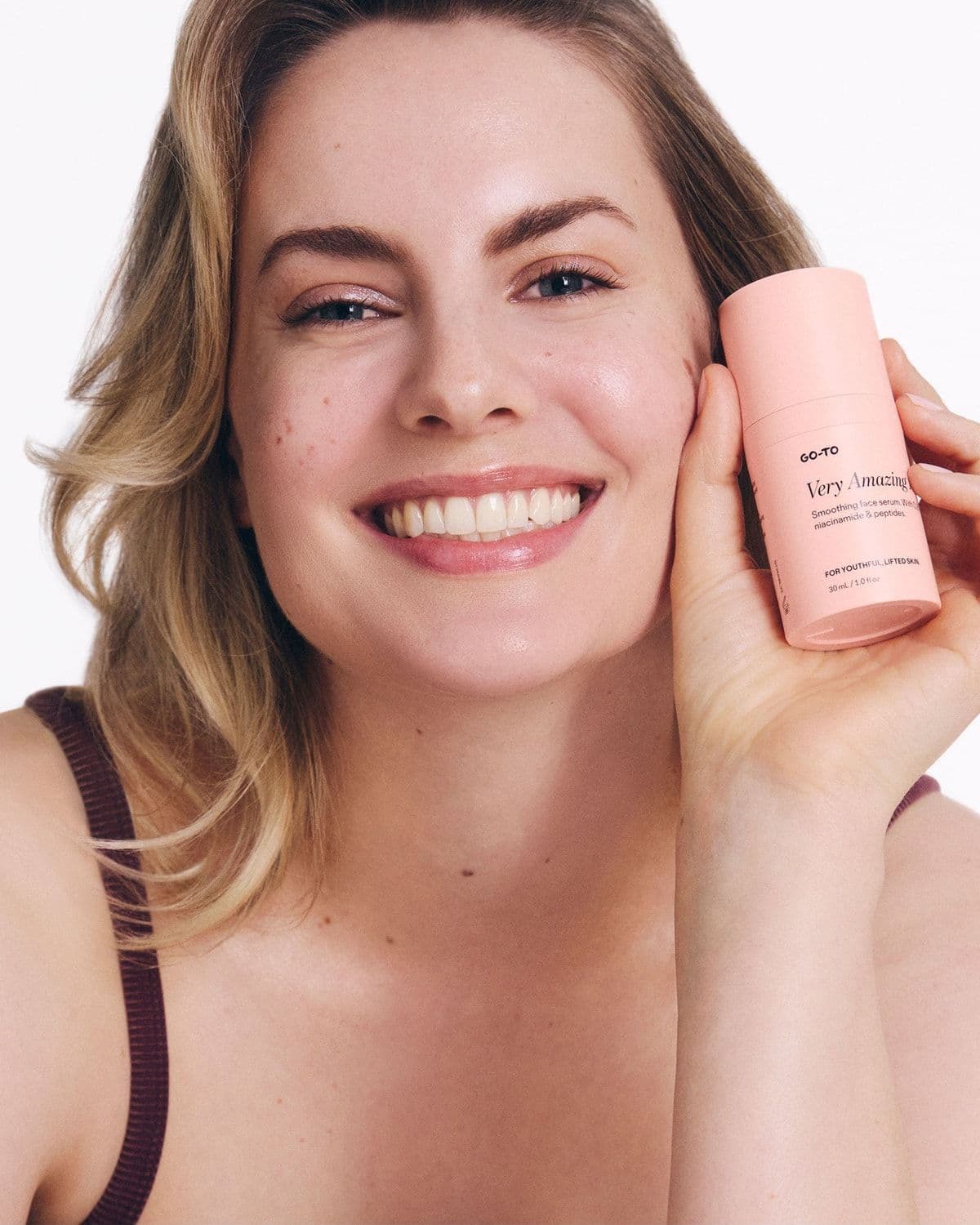 Editorial beauty profile shot with 'Ingredients' copy overlay (Buriti Oil, Rosehip Oil, Jojoba Oil), Very Amazing Retinal PDP