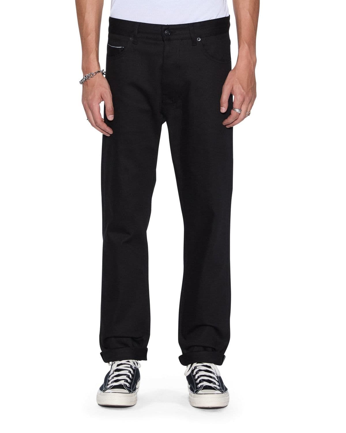 Model wearing black selvedge raw denim Hazlow jeans
